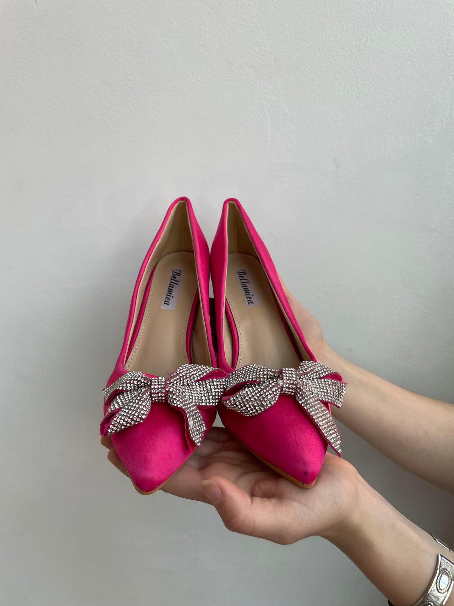 Pink heels with glitter bow