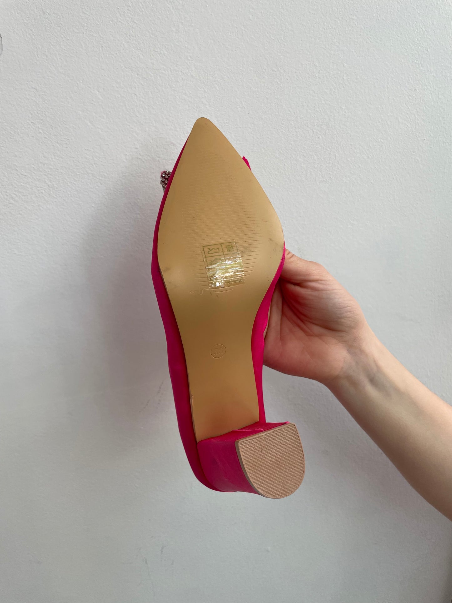 Pink heels with glitter bow