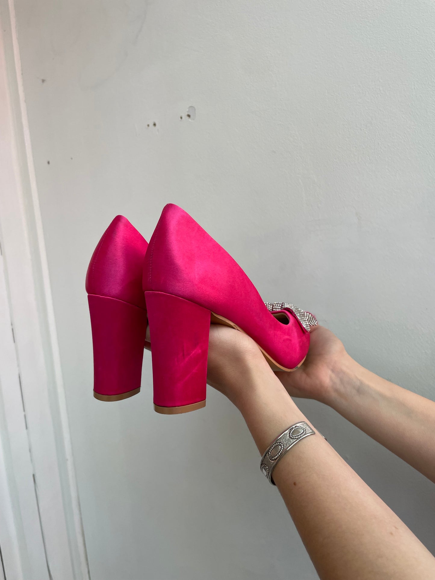 Pink heels with glitter bow