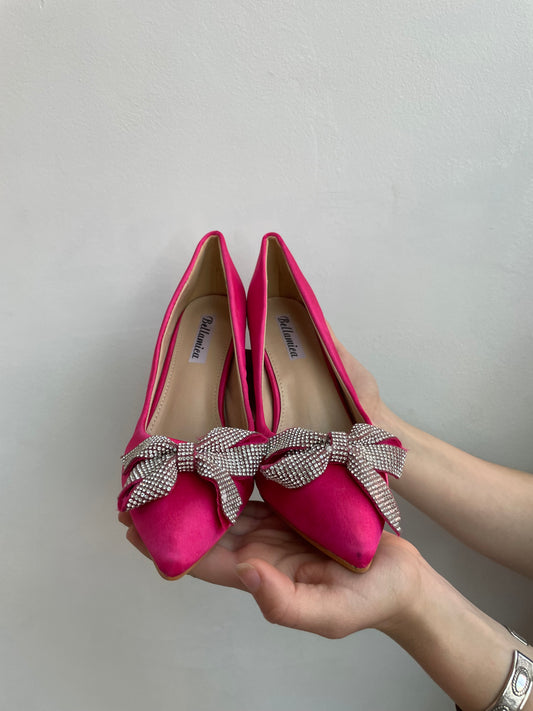 Rosa Heels mit Glitzerscheife