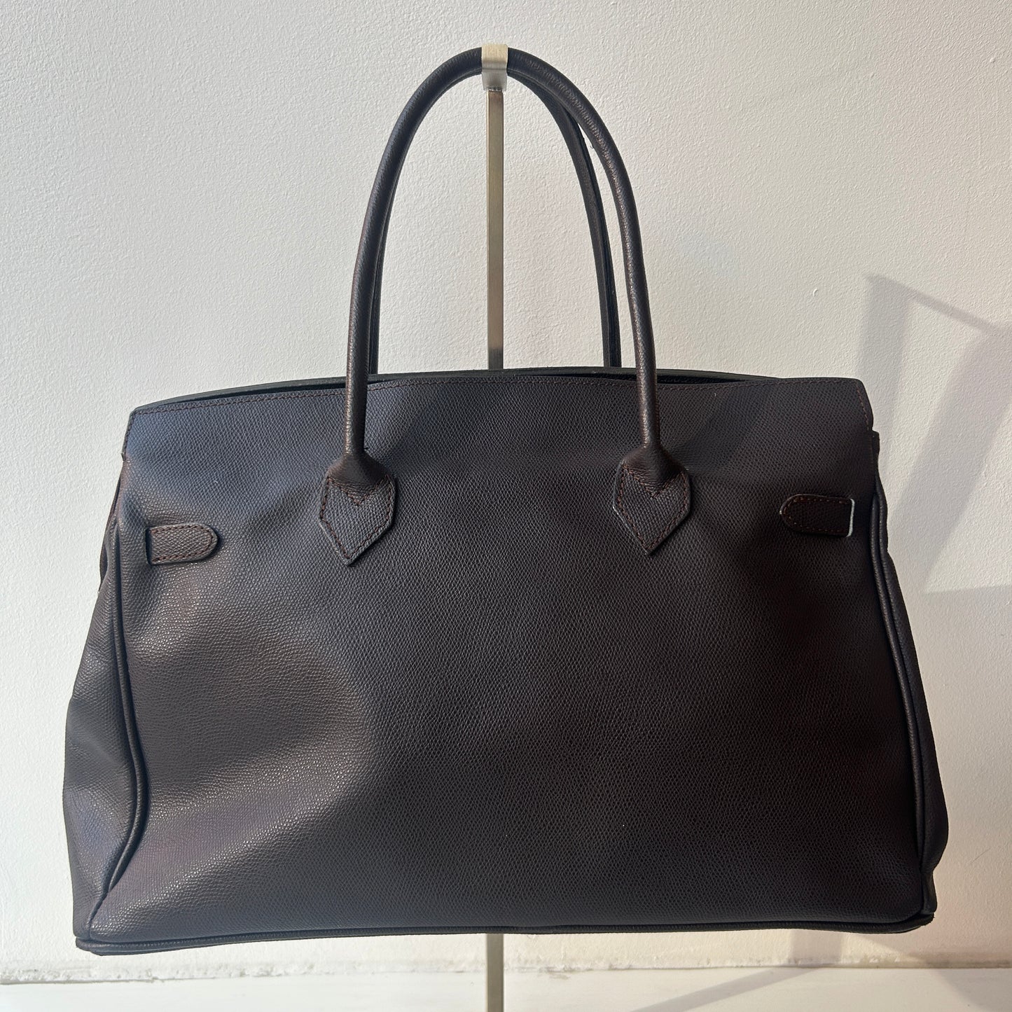 Brown leather firkin bag