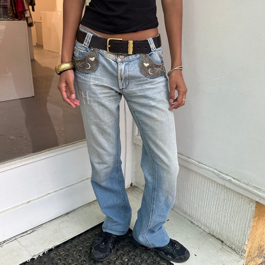Jeans mit Kunstledertaschen