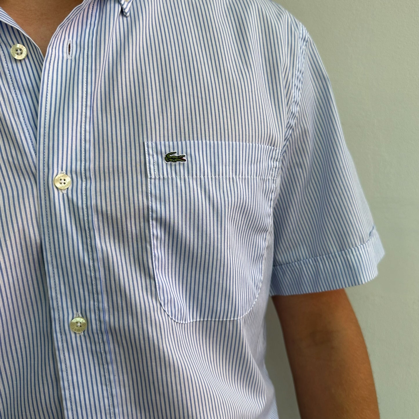 Blue Lacoste shirt
