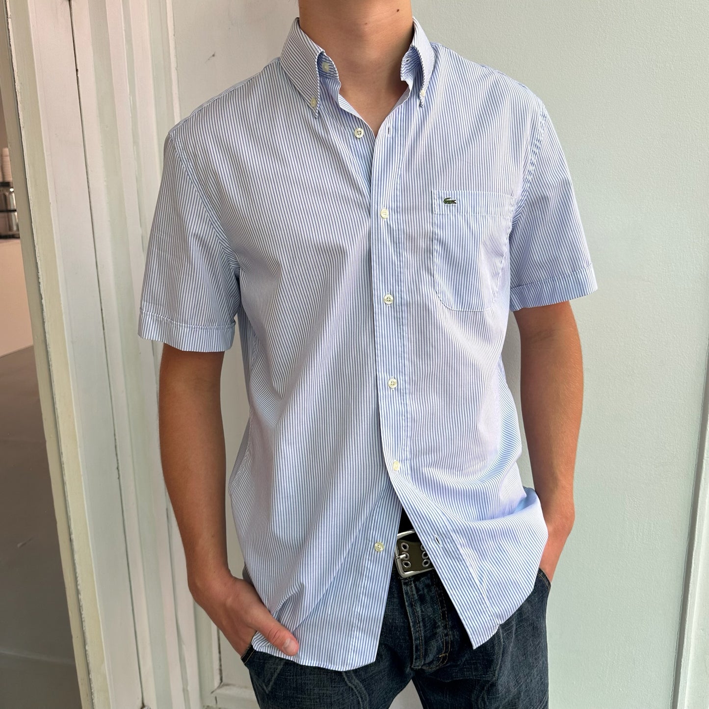 Blue Lacoste shirt