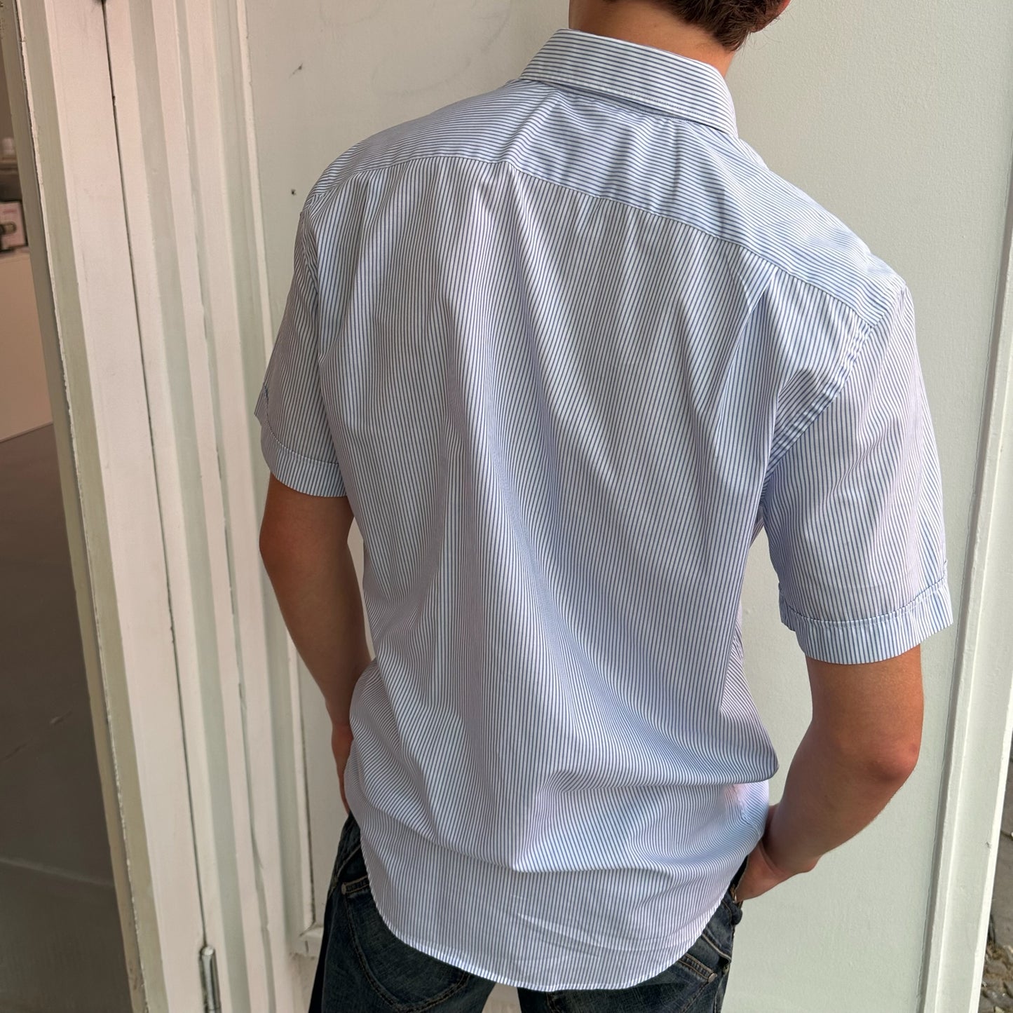 Blue Lacoste shirt